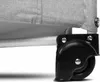 A close-up view of the wheel and frame of a travel crib. Anteprima dell’immagine prodotto