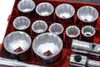A close-up view of a set of metal sockets in a red toolbox. Produktbild-Vorschau