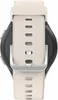 A close-up view of the back of a smartwatch with a beige strap and silver buckle. Produktbild-Vorschau