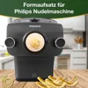 A Philips noodle maker with pasta coming out, placed on a wooden table with a kitchen in the background. Náhľad obrázku produktu