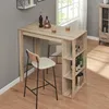 A bar table with shelves and a stool in a room with a window. Anteprima dell’immagine prodotto