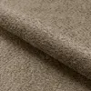 A close-up view of a textured brown fabric, likely upholstery or carpet. Náhled obrázku produktu