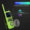 A bright green walkie-talkie is shown in a dark setting, with a graphic illustrating sound waves and text highlighting product features. Voir les images du produit