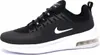 A black and white Nike Air Max Axis shoe is shown from the side against a white background. Voir les images du produit