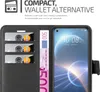 A close-up view of a black wallet-style phone case with cards and money inserted, alongside a smartphone displaying the time and date. Náhled obrázku produktu