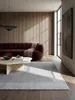 Teppich Grau rechteckig Editorial Interior als Designobjekt drapiert hochwertige Wohnaccessoires_#sku_BARK503119374985-BARK503119374986-BARK503119374987#