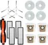 A collection of cleaning accessories for a robot vacuum cleaner, including brushes, filters, and dust bags, arranged on a white background. Produktbild-Vorschau