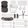 A collection of disassembled parts for a baby high chair, laid out on a white background. Voir les images du produit