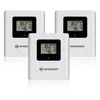 Three white digital thermometers with black screens are arranged in a staggered formation against a white background. Produktbild-Vorschau