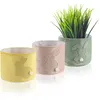 com-four® 3x Oster-Übertopf - Osternest mit Osterhase zum Produktbild-Vorschau 1