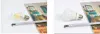 Two light bulbs are shown next to a magazine and a measuring tape. Produktbild-Vorschau
