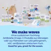 A collection of Omega-3 product packaging arranged on a counter with some decorative elements. Produktbild-Vorschau