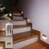 A collage of images showing staircase lighting, a decorative lantern, and a wall detail. Produktbild-Vorschau