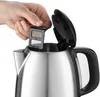 A hand is shown removing a filter from a stainless steel electric kettle. Produktbild-Vorschau