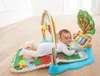 A baby is playing on a colorful VTech musical playmat with various attached toys. Produktbild-Vorschau