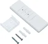 A white remote control with buttons for up, down, and stop, along with a clear plastic bracket and mounting hardware, is laid out on a white background. Produktbild-Vorschau