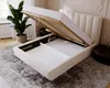 A bed with its storage compartment open, revealing the interior. Náhled obrázku produktu