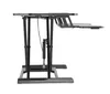 A black adjustable standing desk converter shown from the side against a white background. Anteprima dell’immagine prodotto