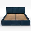 A dark blue upholstered bed frame with a slatted base, shown from the front. Produktbild-Vorschau