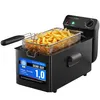 A black deep fryer filled with french fries, with a silver basket and handle. There is a label on the side of the fryer. Produktbild-Vorschau