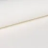A close-up view of a beige fabric, likely a sofa. Podgląd zdjęcia produktu