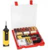 A repair kit for wood surfaces, including a heating tool, various colored repair sticks, and batteries, laid out in a red plastic case. Náhled obrázku produktu
