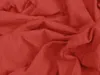 A close-up view of crumpled red fabric. Produktbild-Vorschau