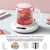 A glass mug with fruit slices in it sits on a white warming base, with other beverage containers shown below. Produktbild-Vorschau