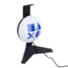 A black headset stand with a white circular light featuring the Playstation logo. Anteprima dell’immagine prodotto