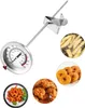 A thermometer and various fried foods. Produktbild-Vorschau