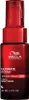 A product shot of a red and black bottle of Wella Ultimate Repair Night Serum. Anteprima dell’immagine prodotto