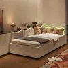 A bedroom scene with a bed, bedside table, and rug. Anteprima dell’immagine prodotto