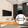 A modern living room with a TV mounted on the wall, a TV stand, and a sofa. A circular inset shows a TV wall mount. Produktbild-Vorschau