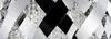 A close-up, abstract view of a decorative light fixture with interwoven metallic and crystal elements. Náhľad obrázku produktu