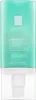 A product shot of a teal and white skincare bottle with a pump dispenser. Anteprima dell’immagine prodotto