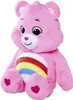 A pink plush Care Bear with a rainbow on its belly sits against a white background. Produktbild-Vorschau