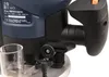A close-up shot of a power router, focusing on the handle and adjustment mechanisms. Náhled obrázku produktu