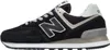 A side view of a black New Balance sneaker. Náhled obrázku produktu