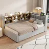A bedroom scene with a sofa bed, shelves, and decor. Podgląd zdjęcia produktu