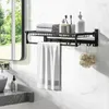 A bathroom shelf with towels and toiletries. Produktbild-Vorschau