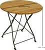 A round wooden garden table with a green metal folding frame, shown from a slightly elevated angle. Produktbild-Vorschau