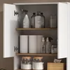 An open cabinet filled with cleaning supplies and toiletries. Produktbild-Vorschau