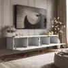 A modern living room with a wall-mounted TV cabinet and a large television. Náhľad obrázku produktu