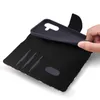 A hand is shown inserting a phone into a flip-style phone case. Produktbild-Vorschau