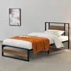 A single bed frame with a wooden headboard and footboard, set against a plain wall. Produktbild-Vorschau