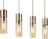 Four identical pendant lights hanging against a white background. Náhľad obrázku produktu