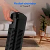 A hand is shown gripping the handle of a black tower fan in a living room setting. Produktbild-Vorschau