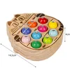 A wooden cat-shaped toy with colorful balls inside, showing dimensions. Náhled obrázku produktu