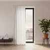 A room interior with a window, curtains, and a plant. Produktbild-Vorschau