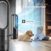 A baby and a golden retriever puppy lying on the floor next to a tower fan. Produktbild-Vorschau